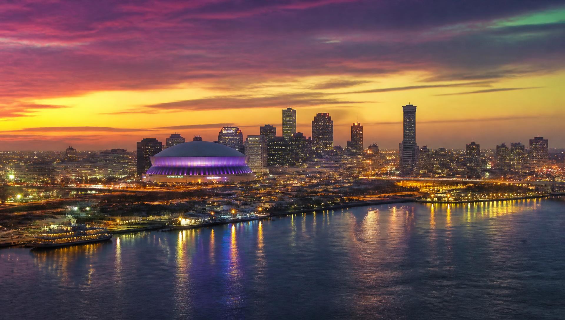 New Orleans skyline and Superdome at dusk